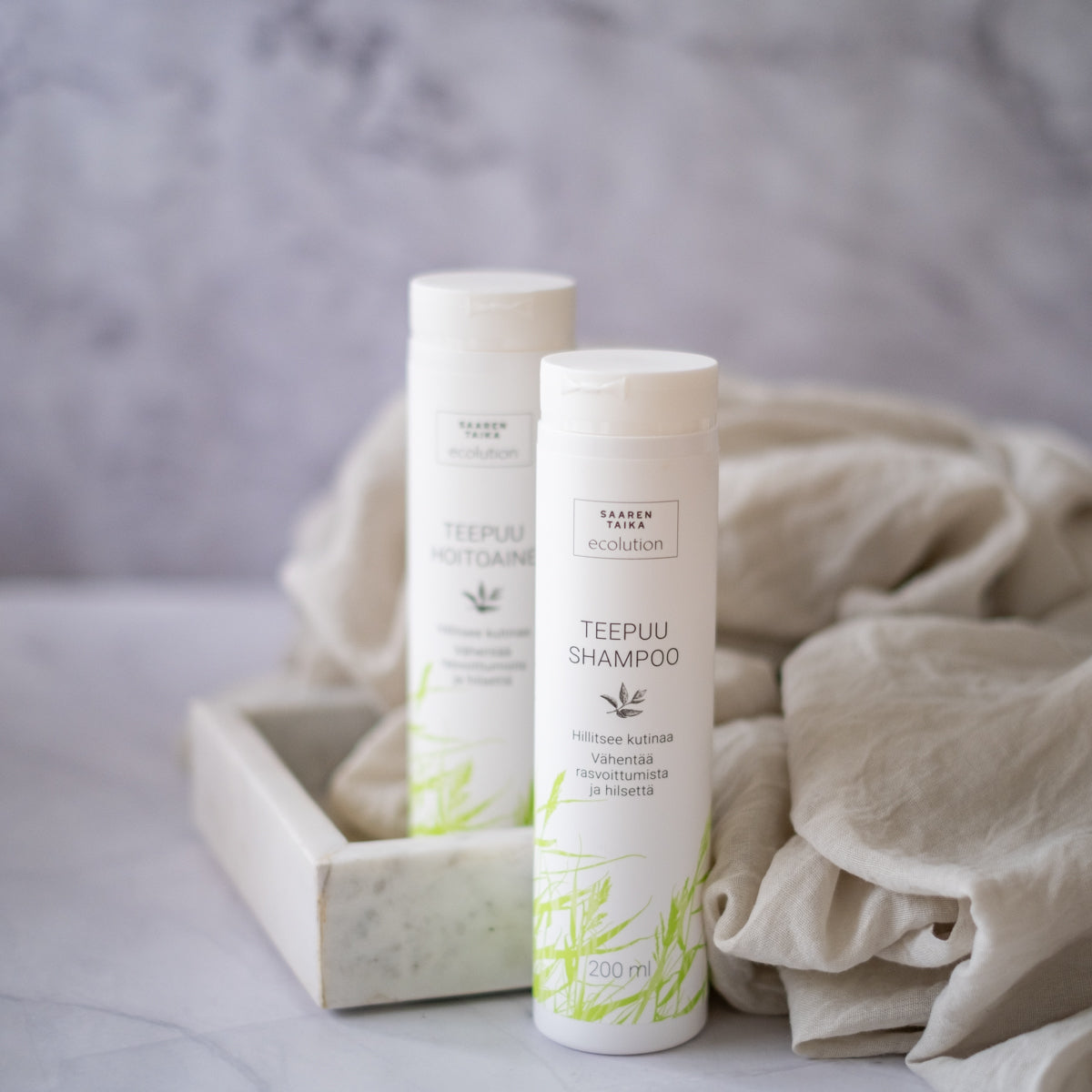 Nestemäinen Teepuushampoo, hilseelle, kutiavalle päänahkalle, normaaleille ja rasvoittuville hiuksille, luonnollinen, silikoniton, parabeeniton, 200ml - Saaren Taika Ecolution